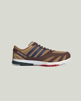 adidas Originals x Noah Lab Race in Brown/Collegiate Gold