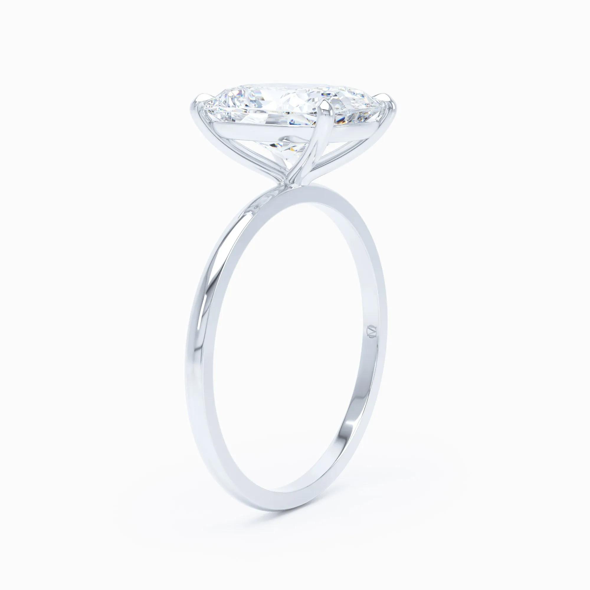 Petite Solitaire - Elongated Cushion Engagement Ring